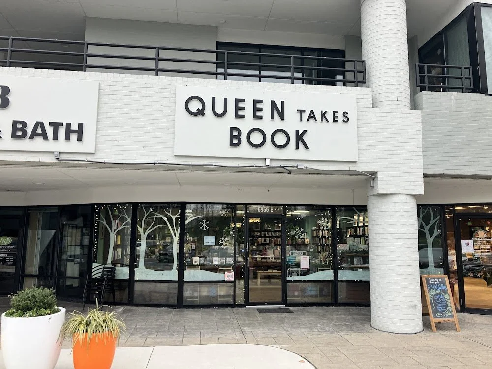 Queen Takes Book